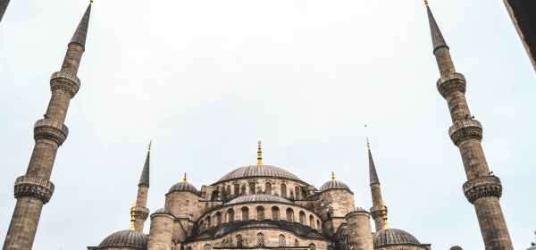 low angle photography of brown concrete building